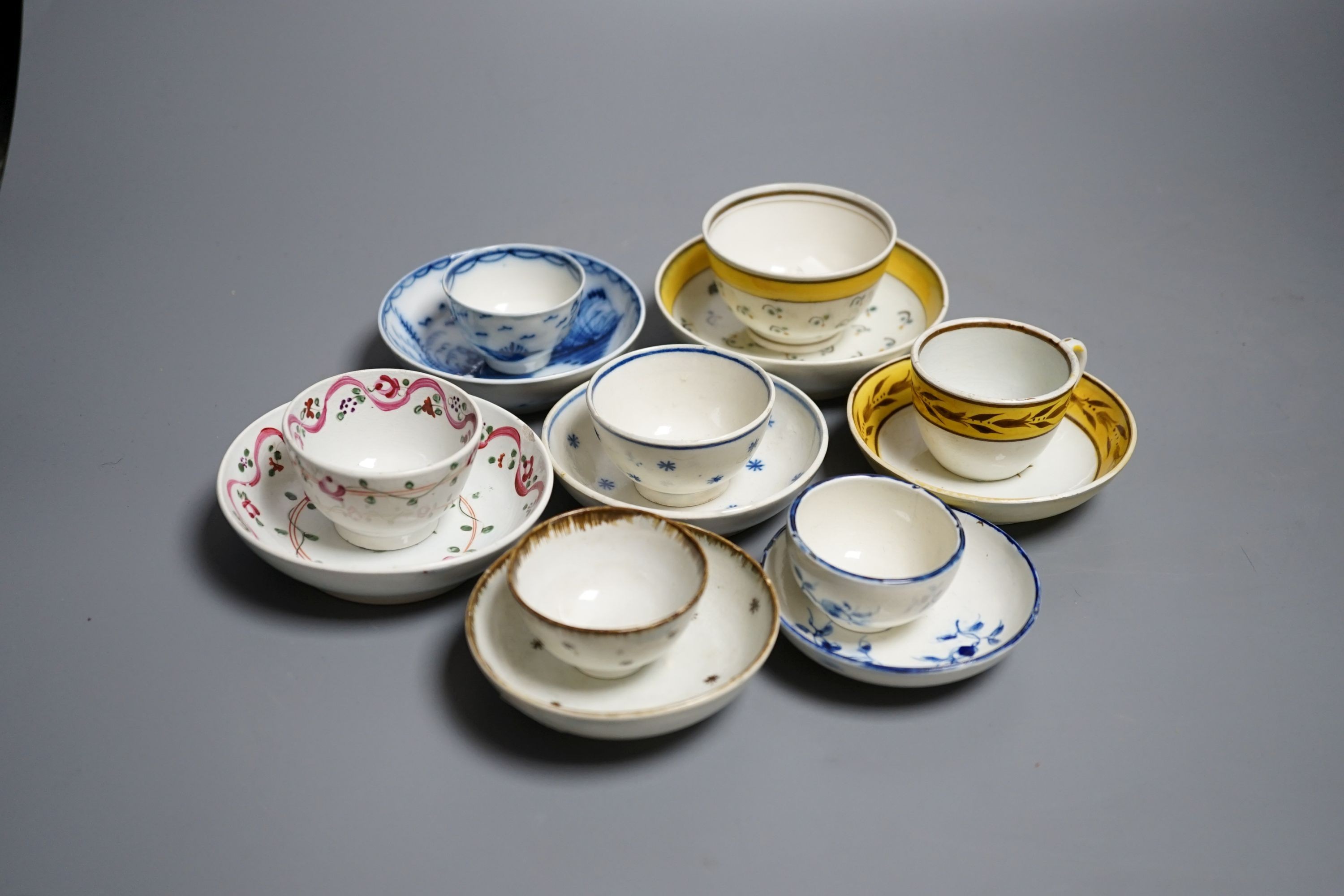 Six pearlware miniature tea bowls and saucers, c.1790-1800 and a similar cup and saucer, c.1810. Provenance - Mona Sattin collection of miniature cups and saucers, collection no.s 273, 276, 281-285.